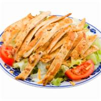 Chicken Salad · Green salad topped with grilled chicken breast and choice of dressing.