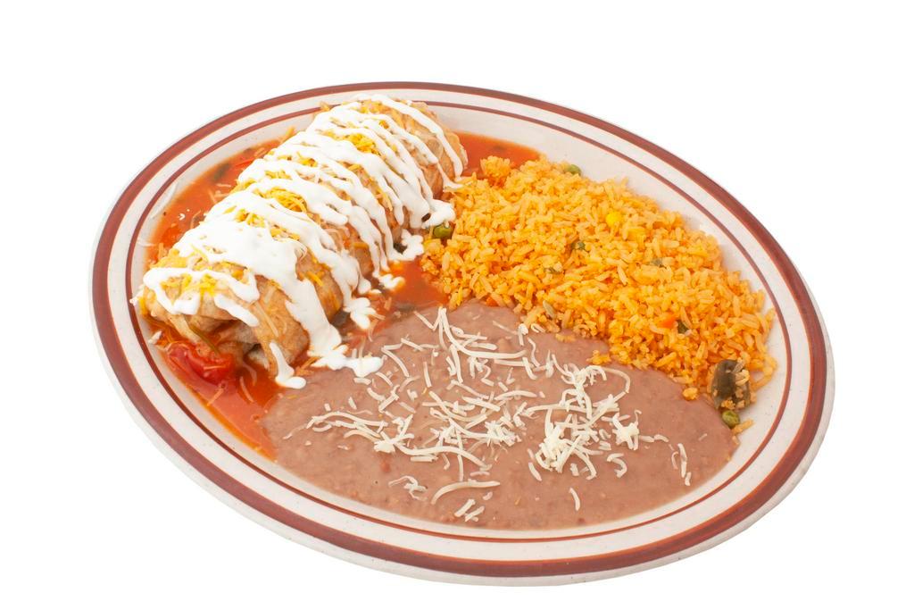 Burrito Plate · Burrito sttuffed with onions, cilantro, salsa and choice of meat and topped with rancher salsa, melted cheese, and sour cream. Served with rice and beans.
