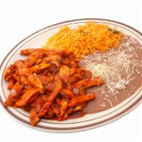 Pollo a la Diabla · Sliced chicken breast grilled and cooked in a spicy red sauce. Served with rice, beans, and ...