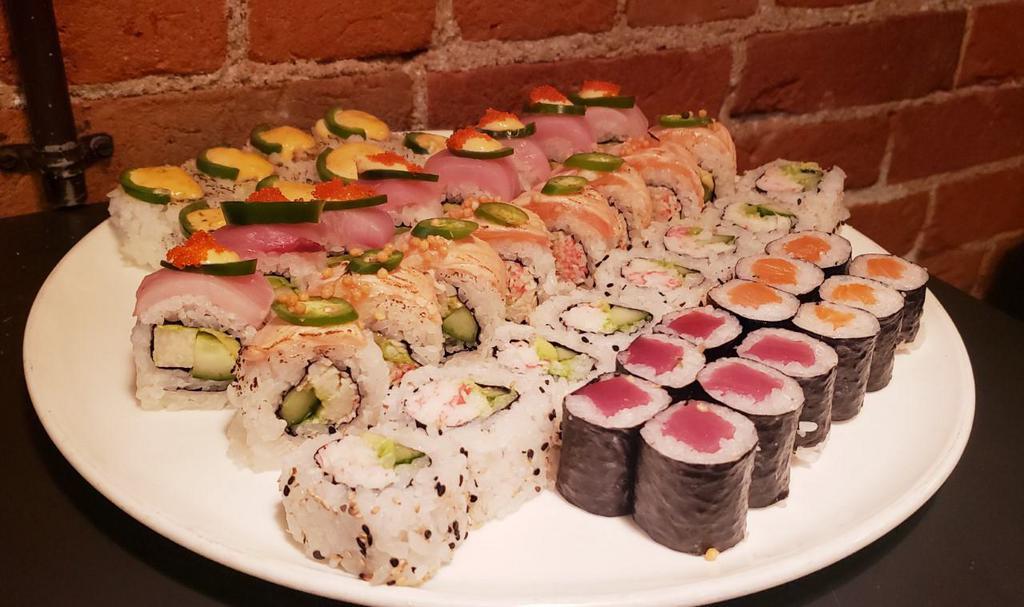 Sensei Maki Combo  (recommended for2)  · 44 pieces total. 1 angry roll (8 pieces), a California roll (8 pieces), 1 hang 10 roll (8 pieces), 1 firecracker roll (8 pieces), 1 tuna maki (8 pieces), 1 salmon maki 6 pieces.