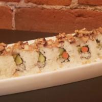 Veg Sushi Roll  · 8 pieces. Marinated mushrooms, gobo, cucumber, avocado, bubu arare.
