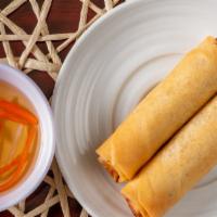 A4. Fried egg rolls (Cha gio) (2 pc) · Shrimps, pork, and veggies packed in flour wrapper and fried to perfection. (Dipping sauce o...