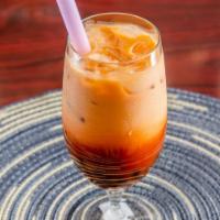 T3. Thai iced tea (Tra Thai) · Just tea, milk, and sugar. Simple ingredients, delicious flavors!
