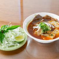 TV2. Bun bo hue (Spicy lemongrass beef noodle soup) · Vietnamese's other popular beef noodle soup. Served with thick round 