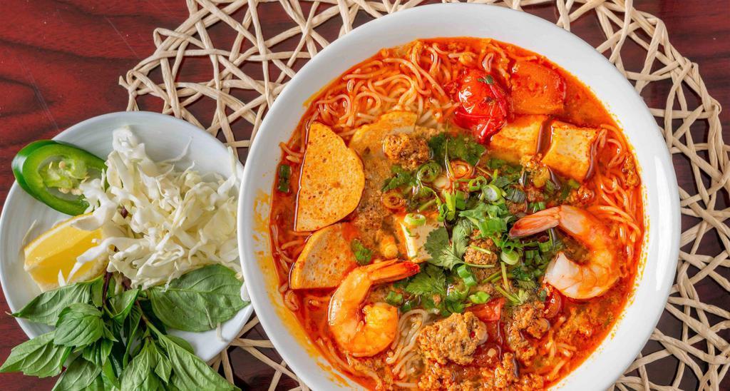 TV3. Bun rieu (Crab paste seafood and pork noodle soup) · Traditional Vietnamese seafood soup served with vermicelli noodle, shrimps, tofu, tomato and pork sausages. (Include side of fresh mixed veggies)
