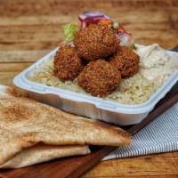 Ani's Falafel Dinner Plate · Served with pita bread, house salad and your choice of rice or fries and spread. Vegetarian.