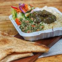 Vegetarian Combo Dinner · Hummus, tabouleh, and grape leaves. Served with pita bread, house salad and your choice of s...