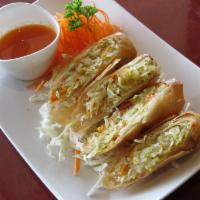 (L) Thai Egg Rolls · Deep fried vegetarian egg rolls, served with Thai sweet and sour sauce.