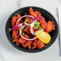 #5 Chicken 65 · Historical Indian spicy deep-fried boneless chicken cube tossed in special chef sauce ( Spic...