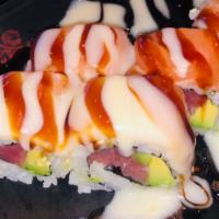 Romance · Tuna,avocado top salmon, white tuna with eel sauce, creamy sauce