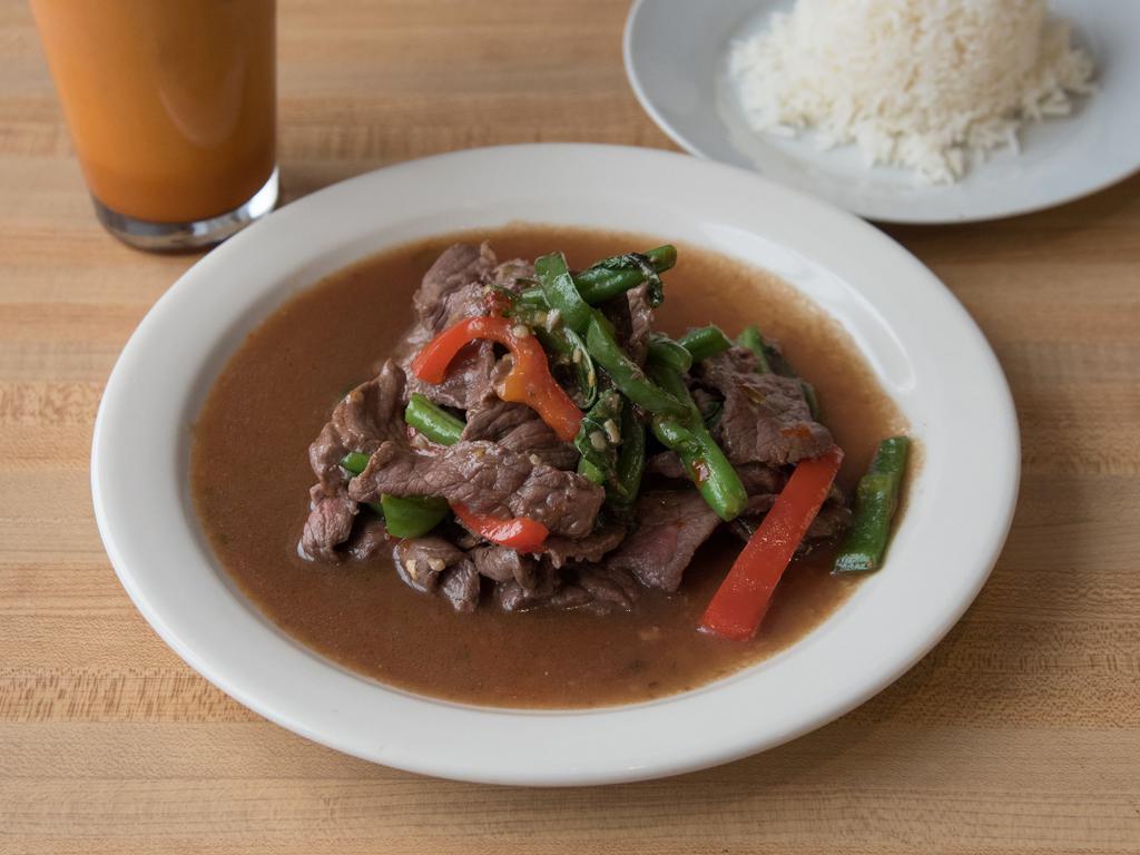 111. Pad Kra Prow · Sauteed choice of meat in a spicy Thai basil leaf and green bean sauce. Served with a scoop of rice.