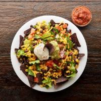 Taco Salad · Shredded lettuce, blue corn chips, cheddar, sour cream. guacamole, pico de gallo, Southwest ...