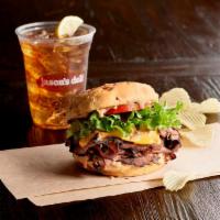 Big E's Deli Burger · Hot roast beef, American cheese, 1000 Island dressing, leafy lettuce, tomato and toasted oni...