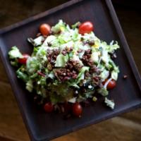 Chopped Salad · Grilled corn, red onion,apple, bleu cheese, cherry tomatoes, candied pecan, and champagne vi...