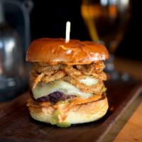 Jalapeno Burger · Chipotle sauce, jalapeno, poblano, pepper jack, and onion ring.