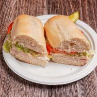 Turkey Sandwich · Boar's Head lower sodium turkey breast, tomatoes, shredded lettuce and choice of spread. Ser...