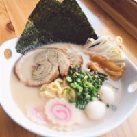 Tonkotsu Ramen Noodle Soup · Japanese egg noodles, rice pork broth, pork chashu, marinated bamboo shoots, boiled eggs, sc...
