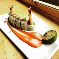 Tom Yum Maki · Shrimps tempura, avocado, jalapeno, scallions, cilantro topped with tempura crumbs, lime lea...
