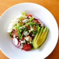 Cobb Salad · Served with grilled chicken, bacon, boiled egg, avocado, radish, bleu cheese crumbles and ch...