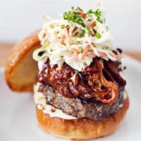 BBQ Burger · Angus beef, pulled brisket, apple fennel slaw, bourbon peach BBQ and smoked mayo.