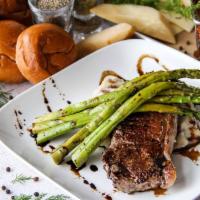 New York Strip Steak · 10 oz. strip steak, herbed red skin mashed potatoes, sauteed asparagus and balsamic vinaigre...