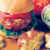 #7 Lump Crab Cake Sandwich · 4 Oz. Maryland crab cake, lettuce, tomato, brioche bun, fries.