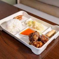 R2. Orange Chicken Rice Box · Battered and cooked in a sweet orange sauce.
