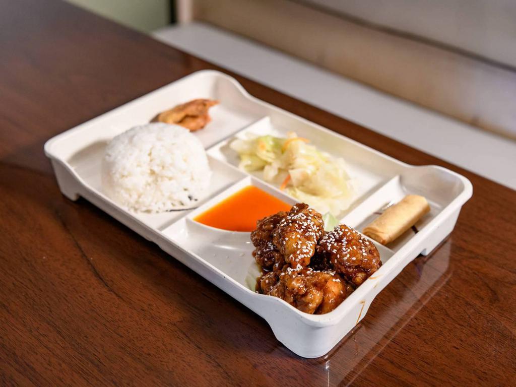 R2. Orange Chicken Rice Box · Battered and cooked in a sweet orange sauce.