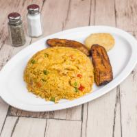 Arroz con Pollo · Chicken and rice. Tomato base rice, shredded chicken, peas and carrots.