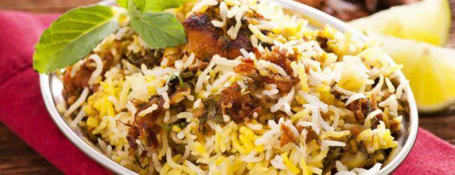 Chicken Rice Biryani · Saffron basmati rice cooked with spiced boneless chicken and nuts. Non-vegetarian.