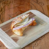 Croissant Ham and Cheese · A flaky French pastry.