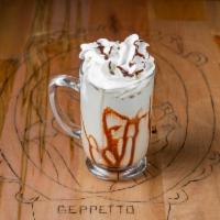 Iced Pinochino · Espresso shaking with ice, chocolate, milk, and whipped cream on the top.
