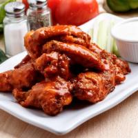 Buffalo Wings · Bone in or boneless. Served with celery and your choice of ranch or bleu cheese dressing.
