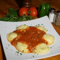 Cheese Ravioli · Served with garlic knots.