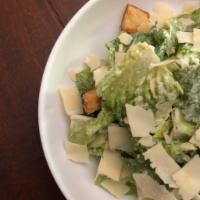 Caesar Salad · Crisp romaine, garlic-herb croutons, shaved parmesan and house-made dressing.