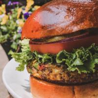 House-Made Veggie Burger · Quinoa, red peppers, peas, beets & corn patty. Lettuce, tomato, red onion and pickle on a br...