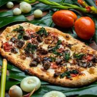 Oxtail Flatbread · Savory tomato confit, roasted portobello mushrooms, topped with deboned slow-braised oxtail,...