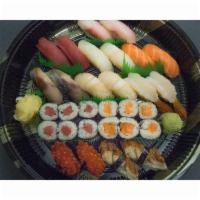 1/2 size Silver Ume Delivery · Platter of sushi with: 2pc Tuna, 2pc Albacore, 2pc Amberjack, 2pc Salmon, 2pc Mackerel, 2pc ...