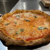 Margherita Pizze · Tomato sauce, mozzarella, basil and extra olive virgin oil.