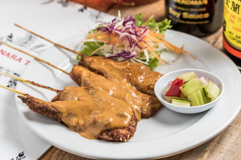 Chicken Satay · 4 chicken skewers with peanut sauce and cucumber relish