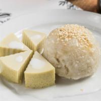 Sticky Rice w/ Custard · thai custard over sticky rice smothered in sweet coconut milk topped with sesame seeds