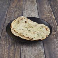 Garlic Naan · Tear drop shaped bread, baked in tandoor oven with fresh minced garlic.