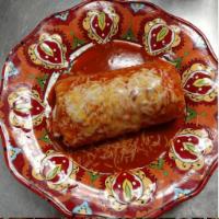 Chimichanga Burrito · A burrito with your choice of meat perfectly fried to a golden crisp.  Try it Wet in Red Sau...