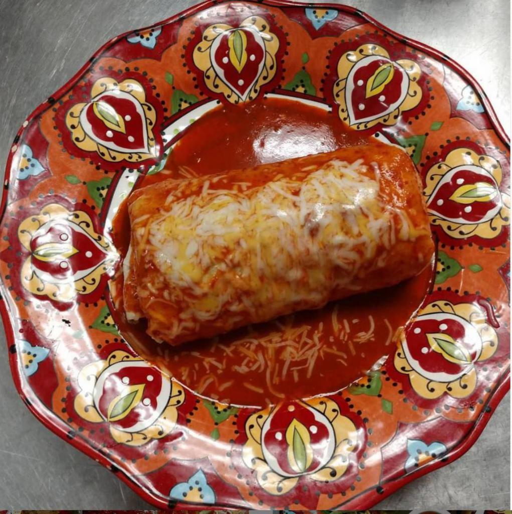 Chimichanga Burrito · A burrito with your choice of meat perfectly fried to a golden crisp.  Try it Wet in Red Sauce and Melted Mexi-Cheese!
