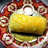 El California Burrito · A classic San Diego import!  Your choice of Meat wrapped with golden fries into a burrito!  ...