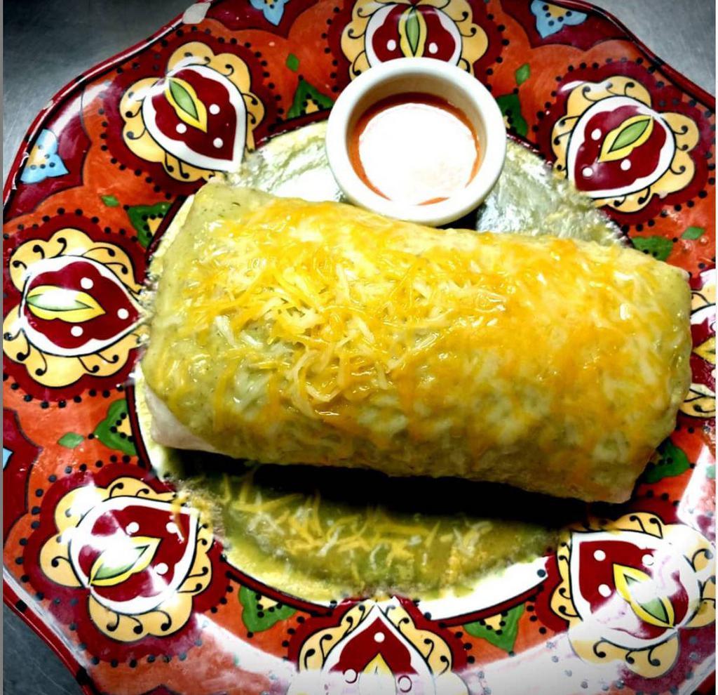 El California Burrito · A classic San Diego import!  Your choice of Meat wrapped with golden fries into a burrito!  Try it Wet with Green Sauce & Melted Cheese!