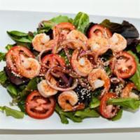 Grilled Shrimp with Lemongrass Salad  · Salad includes lettuce, cucumber, tomato, red onion, served with house dressing.