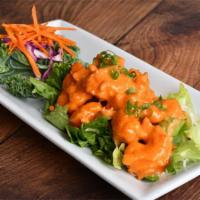 Bang Bang Shrimp Dinner · Black tiger shrimp tossed in Long's spicy sauce and served over lettuce and crispy rice nood...