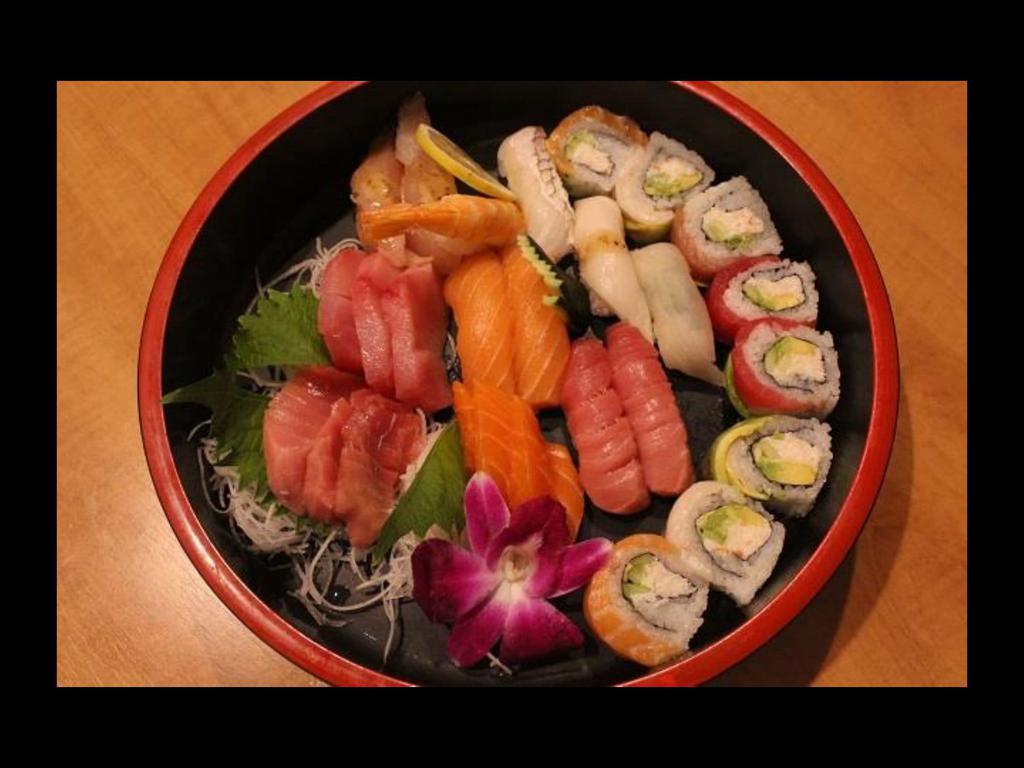Love Sushi Sashimi Combo · Chef’s choice of sashimi 9 pieces, sushi 10 pieces and rainbow roll.