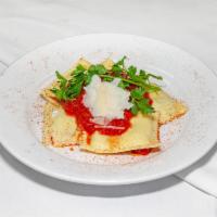 Cheese Ravioli · Cheese-filled, topped with marinara sauce and melted Italian cheeses.